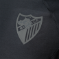 CAMISETA TRAVEL NEGRO MALAGA CF 2025/26