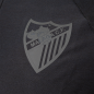 POLO TRAVEL NEGRO MALAGA CF 2025/26