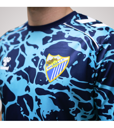 MALAGA CF OFFICIAL PREMATCH NAVY BLUE T-SHIRT 2025/26 -JUNIOR-