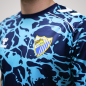 MALAGA CF OFFICIAL PREMATCH NAVY BLUE T-SHIRT 2025/26 -JUNIOR-