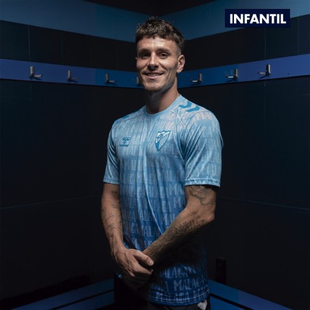 MALAGA CF OFFICIAL PREMATCH LETTERED T‑SHIRT 2025/26 –JUNIOR–