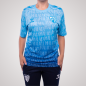 MALAGA CF OFFICIAL PREMATCH LETTERED T‑SHIRT 2025/26 –JUNIOR–